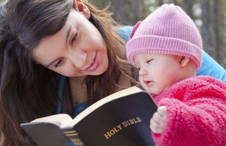 woman enjoying reading the Bible
