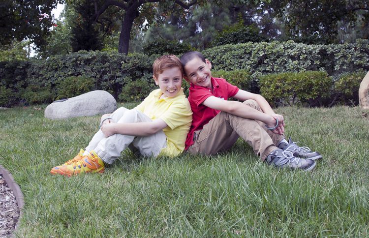 Guideposts: Jonah and Dylan relax in a park.