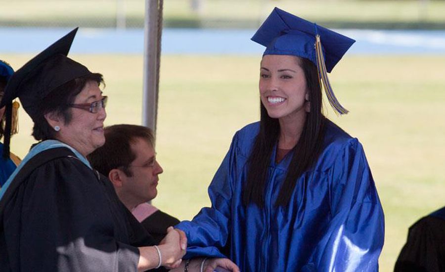 Guideposts: Josey walks across the stage to receive her diploma