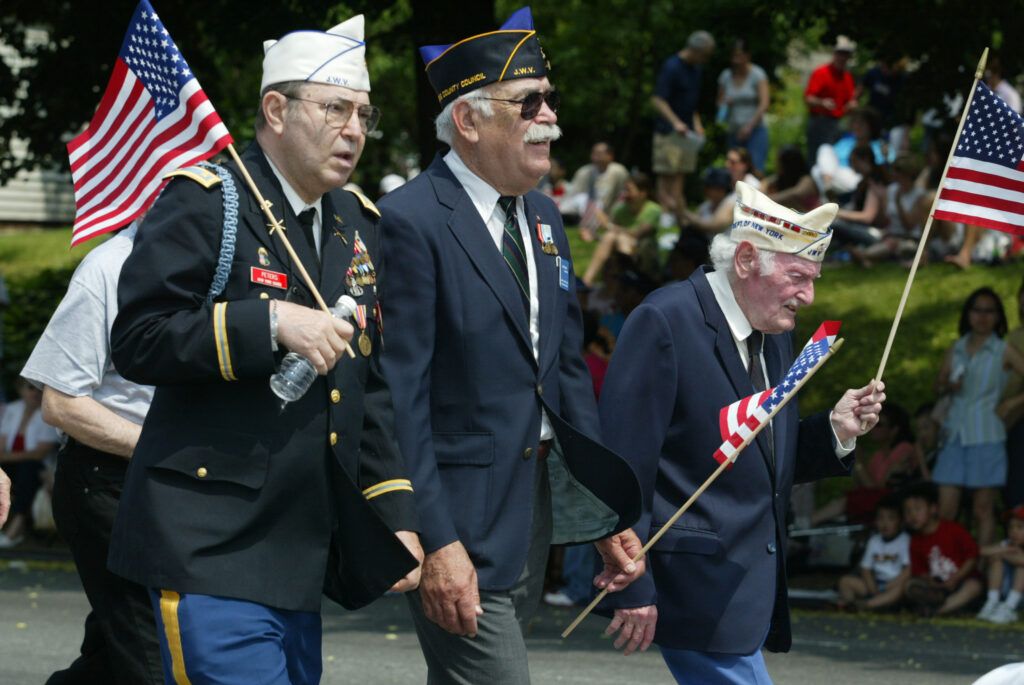 veterans march in parade | Guideposts