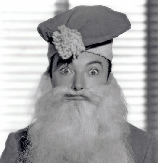 Guideposts: Musical comedy star Jack Haley gives a little ho-ho-ho as a bug-eyed Santa Claus
