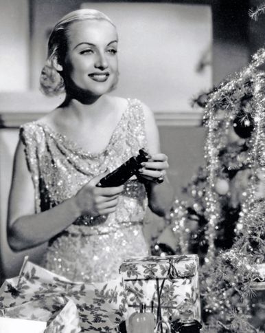 Guideposts: Comedienne Carole Lombard decks the halls in time for Christmas.