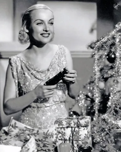 Guideposts: Comedienne Carole Lombard decks the halls in time for Christmas.