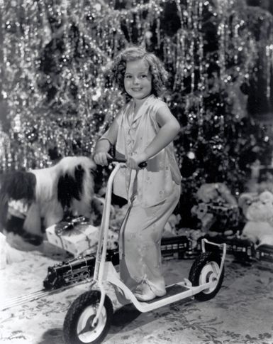 Guideposts: Bubbly child star Shirley Temple enthusiastically celebrates Christmas Day.