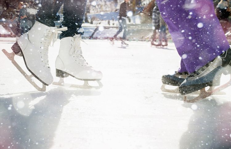 Guideposts: A close-up shot of ice skaters' feet