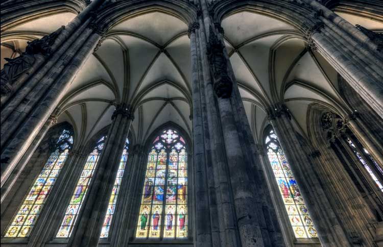 Guideposts: Soaring arches over the Cologne Cathedral's towering windows of stained glass