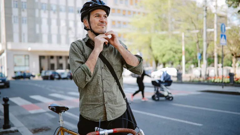 Man getting ready to go for a bike ride during spring