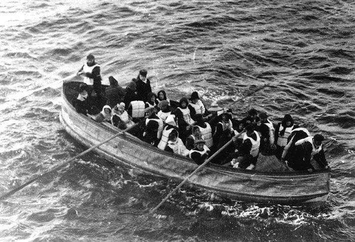 Guideposts: A lifeboat in the water, filled with refugees from the Titanic