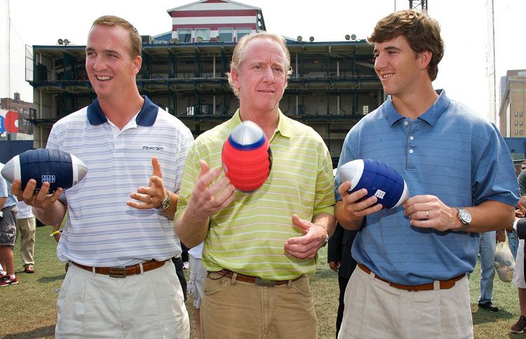 Guideposts: The Manning brothers, Peyton (left) and Eli (right), pose with their father, Archie (center)