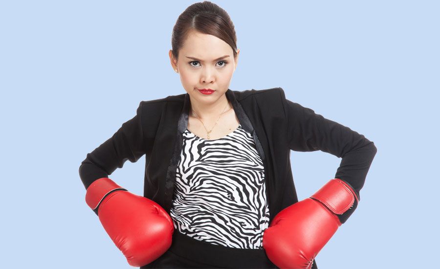 Guideposts: An angry woman has donned boxing gloves, itching for a fight