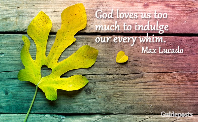 Leaf on a wood background with a heart cut out with a quote saying that God loves us too much to indulge our every whim.