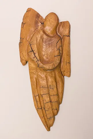 Guideposts: One of  Paula Dimit's carved wooden angels