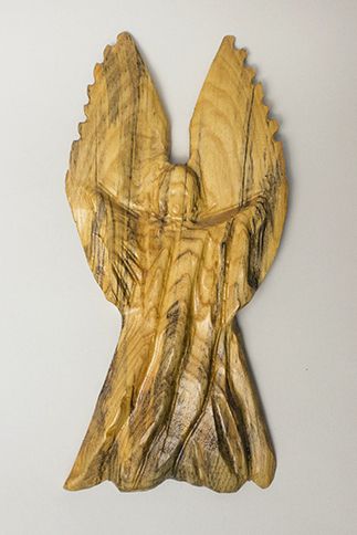 Guideposts: One of  Paula Dimit's carved wooden angels
