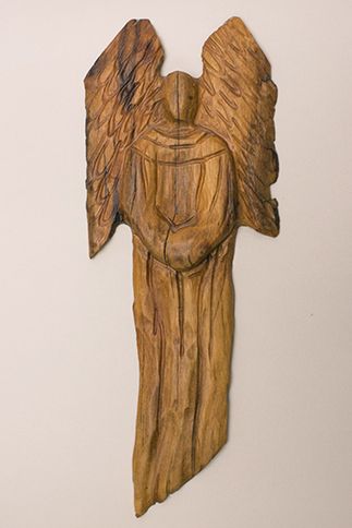 Guideposts: One of  Paula Dimit's carved wooden angels