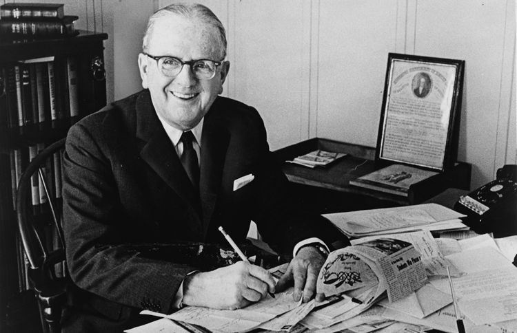 Dr. Norman Vincent Peale in his office