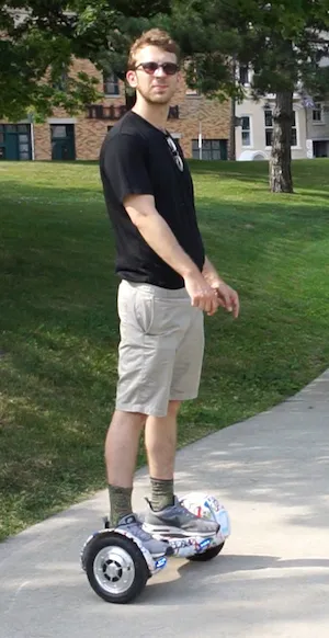 Dan Hoffman learning how to balance on a hover board