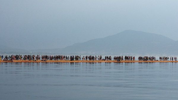 A view of the installation 'The Floating Piers' on the Iseo Lake by the Bulgarian artist Christo Vladimirov Yavachev known as Christoenter on June 8, 2016 in Iseo, Italy. Photo: Pier Marco Tacca/Getty Images