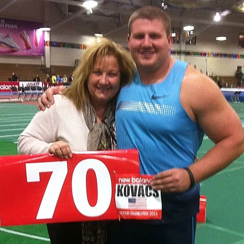 Joe and Joanna celebrate his first shot-put throw over the 70-foot mark in Boston in 2014.