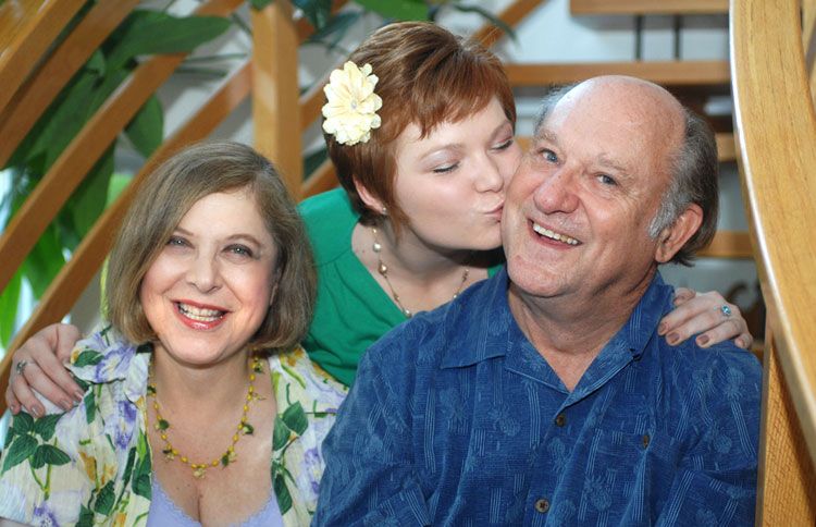 Ashley with her parents, Gay and Phil, in 2010