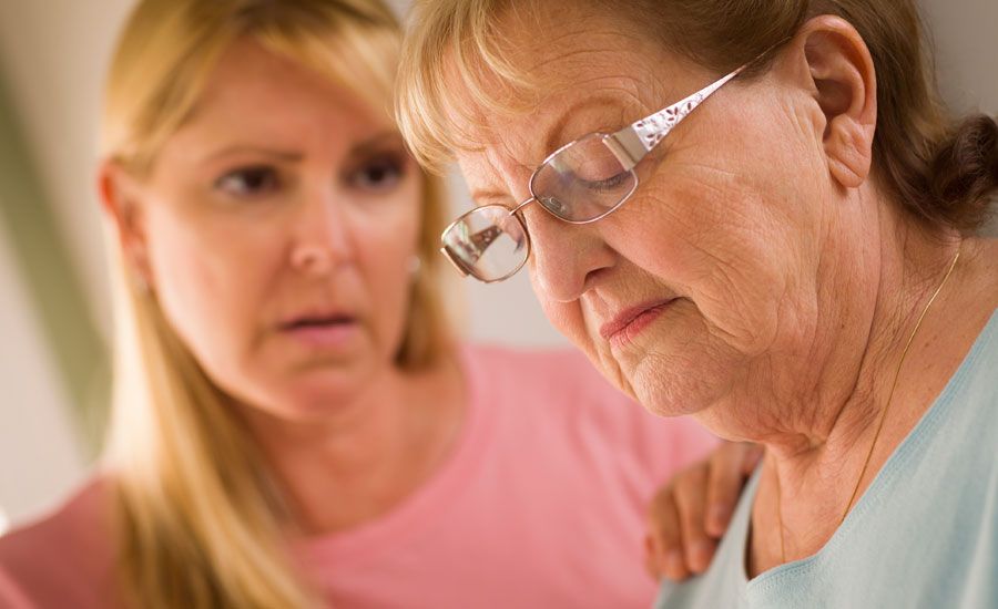 A woman has a difficult conversation with her aging mother