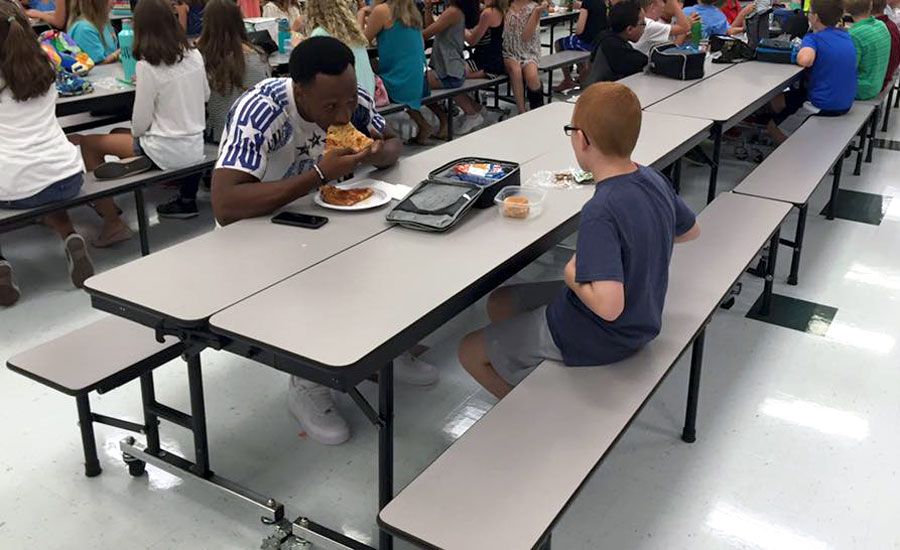 Travis Rudolph lunches with his new friend, Bo Paske