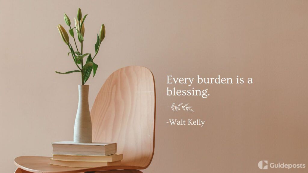 A plant in a vase on a chair with a veterans day quote by Walt Kelly