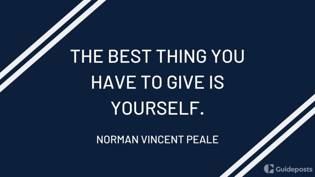 A blue and white graphic with a veterans day quote by Norman Vincent Peale