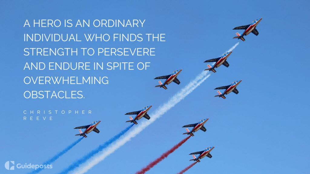 Jets flying through the sky with a veterans day quote by Christopher Reeve