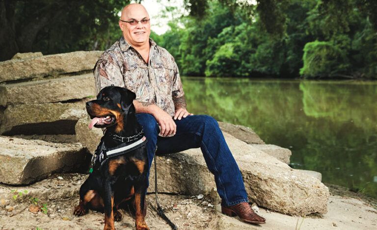 Wren and Beaux, a service dog specially trained for PTSD survivors