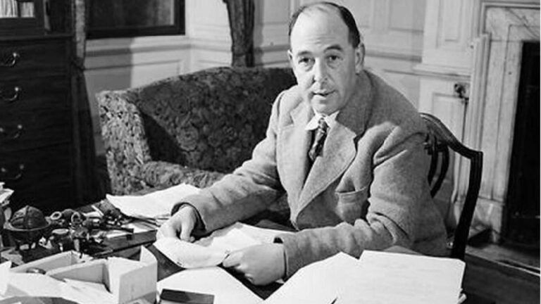 C.S. Lewis sitting at his desk with quotes