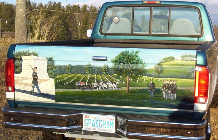 The tailgate of Charlie's truck, now emblazoned with Andrea's painting of Arlington Cemetery
