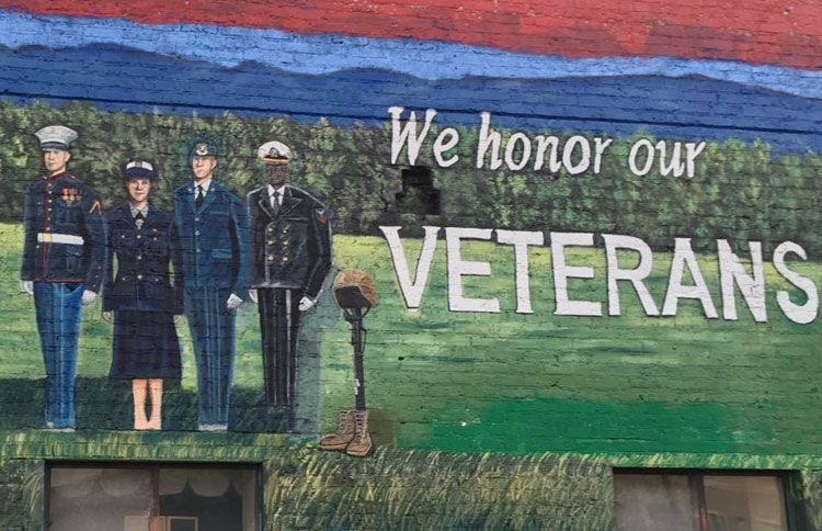 A mural honoring veterans that Andrea painted for the people of Hendersonville