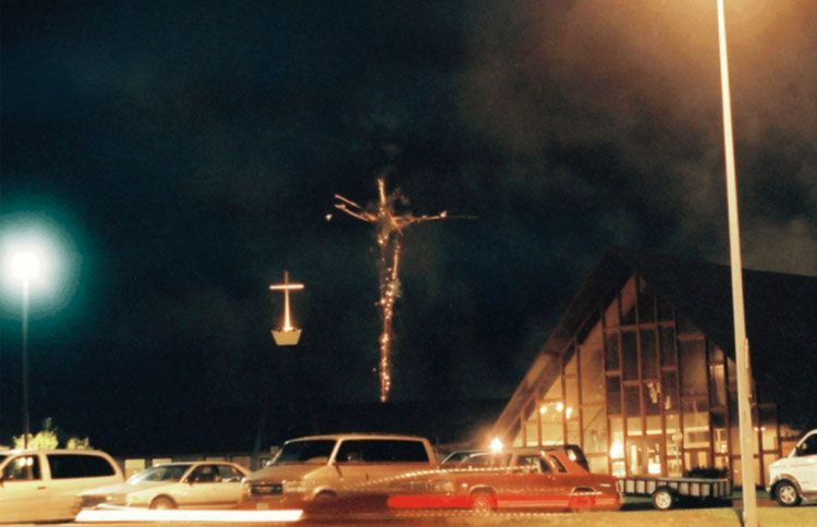 A pair of crosses in a Norfolk, Nebraska, fireworks show