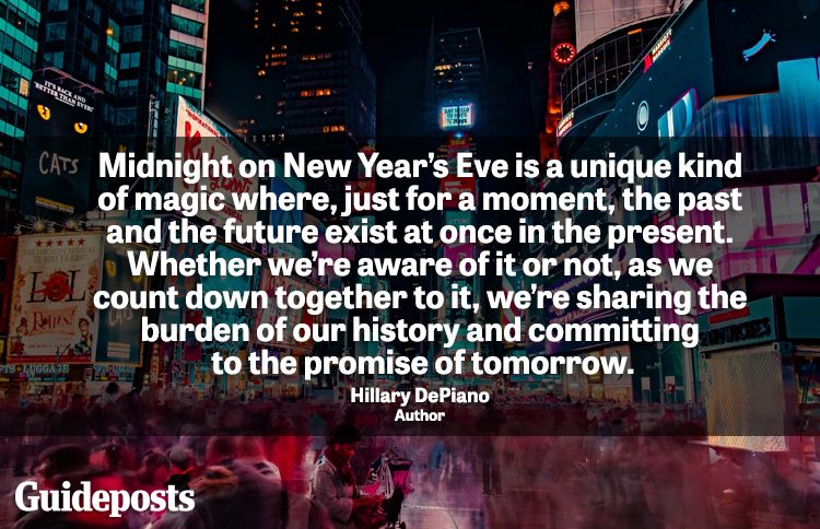 Times Square in New York City on New Years Eve with new year quote about family