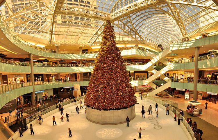 Guideposts: The Galleria Dallas tree, which weighs five tons, towers four stories above the Galleria's ice-skating rink and is topped by a 10-foot star illuminated by LED lights.