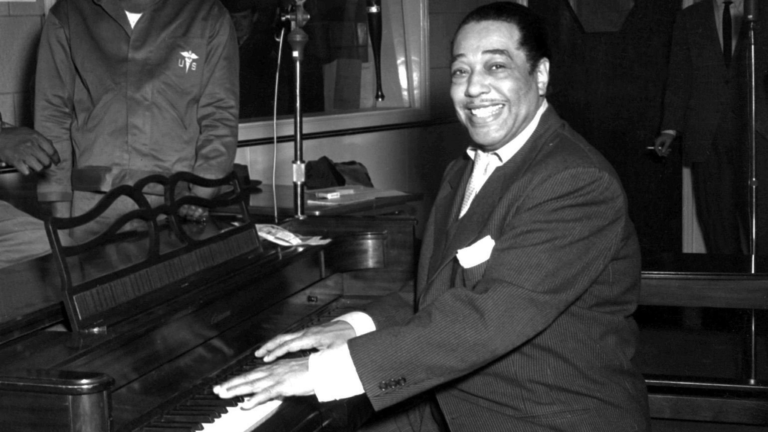 Duke Ellington sits at a piano as an inspiring figure for Black History Month