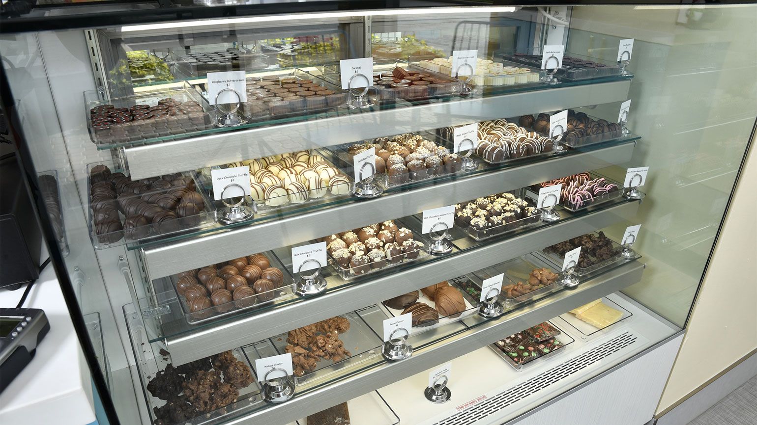 The display counter at the Chocolate Spectrum boasts a wide array of baked goods and chocolate treats