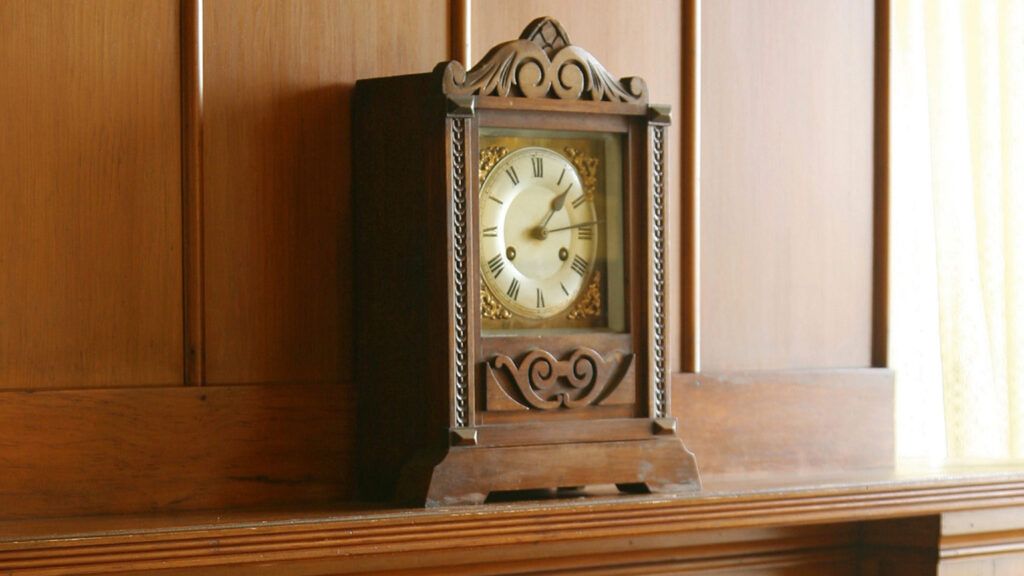 An old clock on the mantle