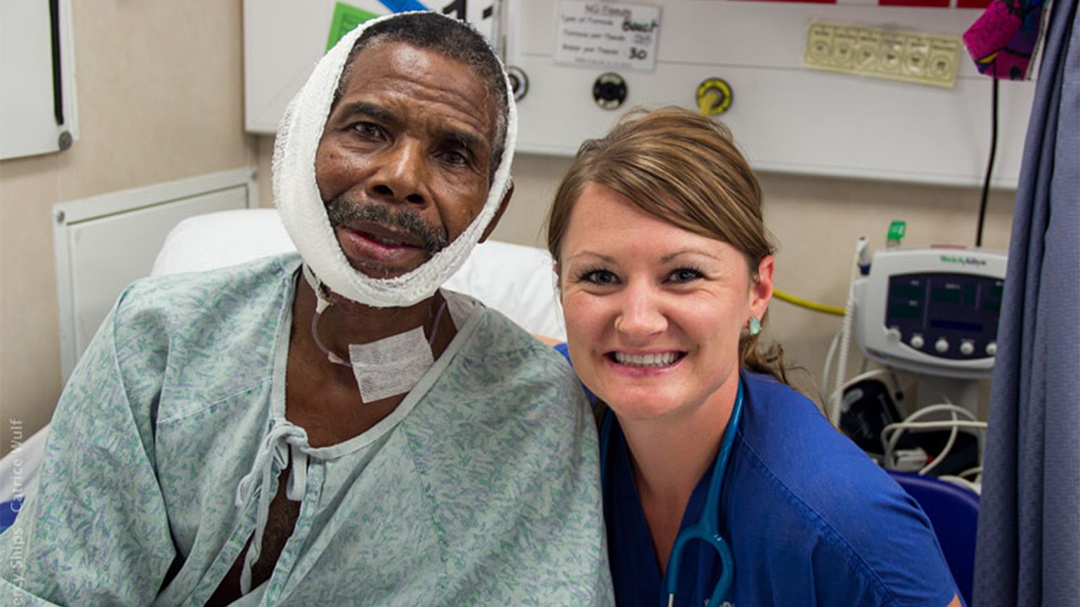 Heather poses with William, one of her patients, who taught her a lesson about healing