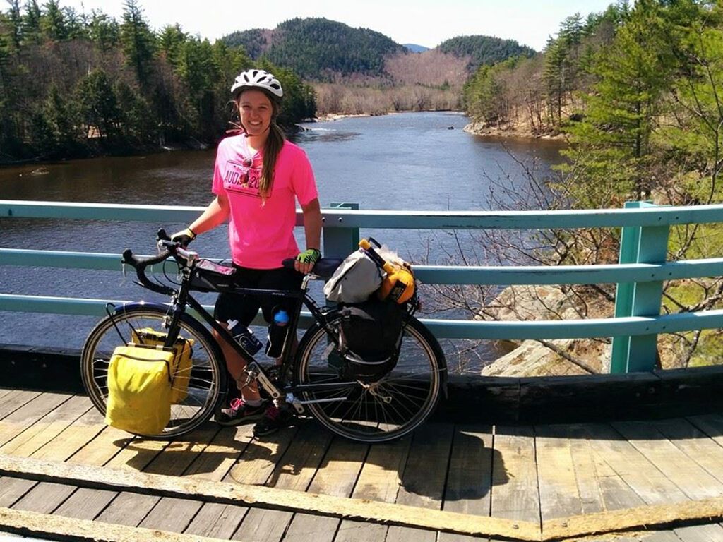Deborah pauses on a bridge over the Androscoggin River near Gilead, Maine