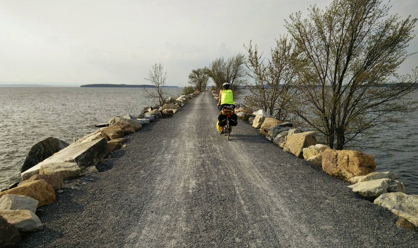 Deborah pedals along Vermont's Lake Champlain Causeway.