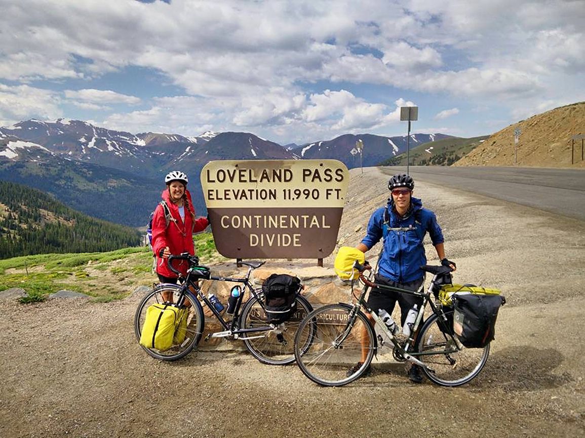 Deborah and her friend and traveling companion, Mark, pause at the summit of Colorado's Loveland Pass