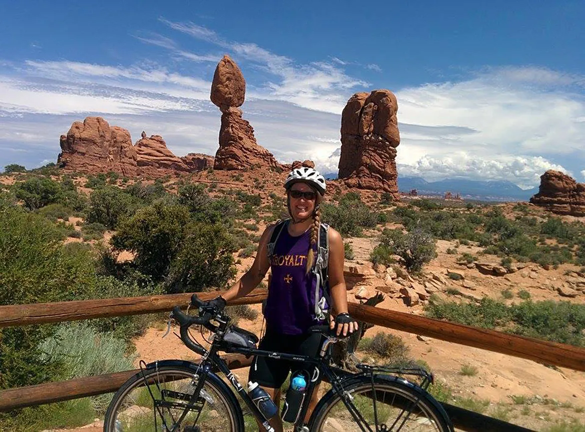 Deborah pauses to savor the majestic scenery in Arches National Park, near Moab, Utah