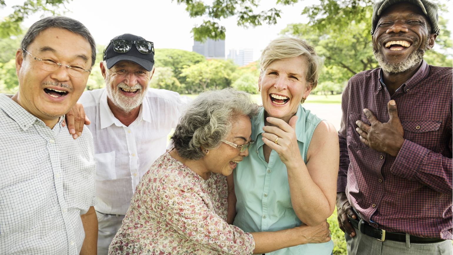 A group of senior citizens share a laugh together