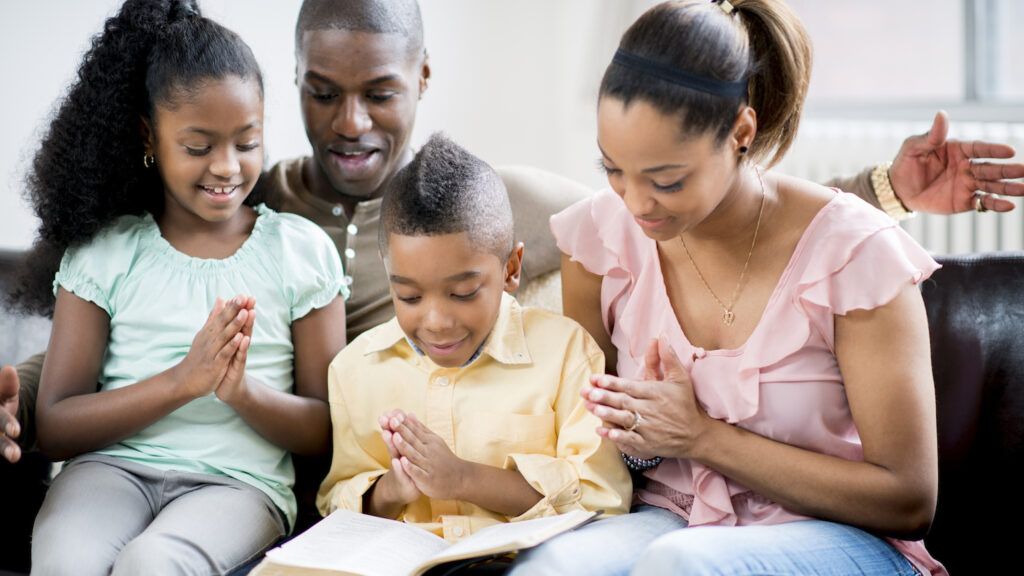 A family celebrates Trinity Sunday.