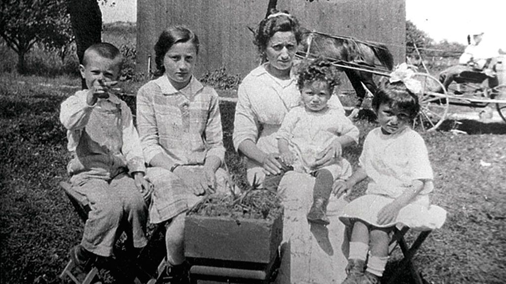 oldA Melchionne family portrait, c. 1917: baby Elena on mother Amelia’s lap