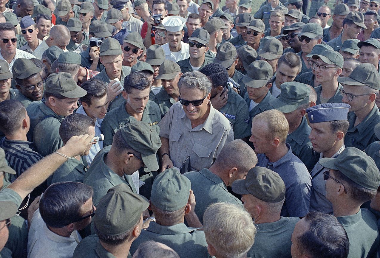 Graham is greeted by hundreds of American servicemen on Dec. 21, 1966, during his Christmas trip to Vietnam.
