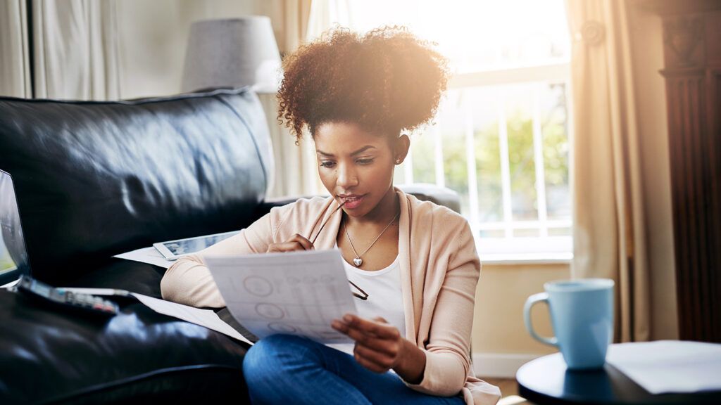 A woman works on her financial planning