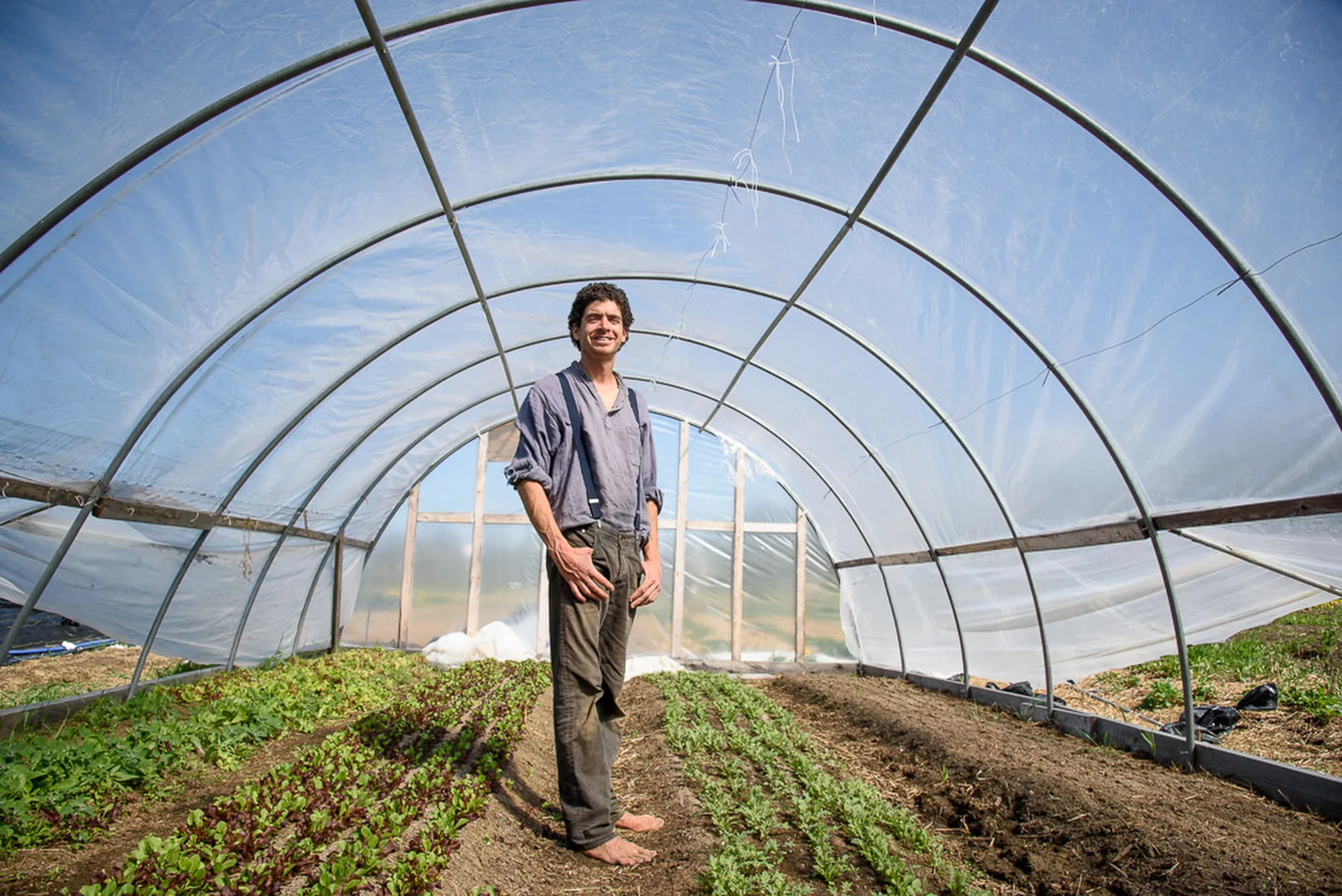 Michael stands proudly on the grounds of Folklore Farm in the town of Cherryfield, Maine