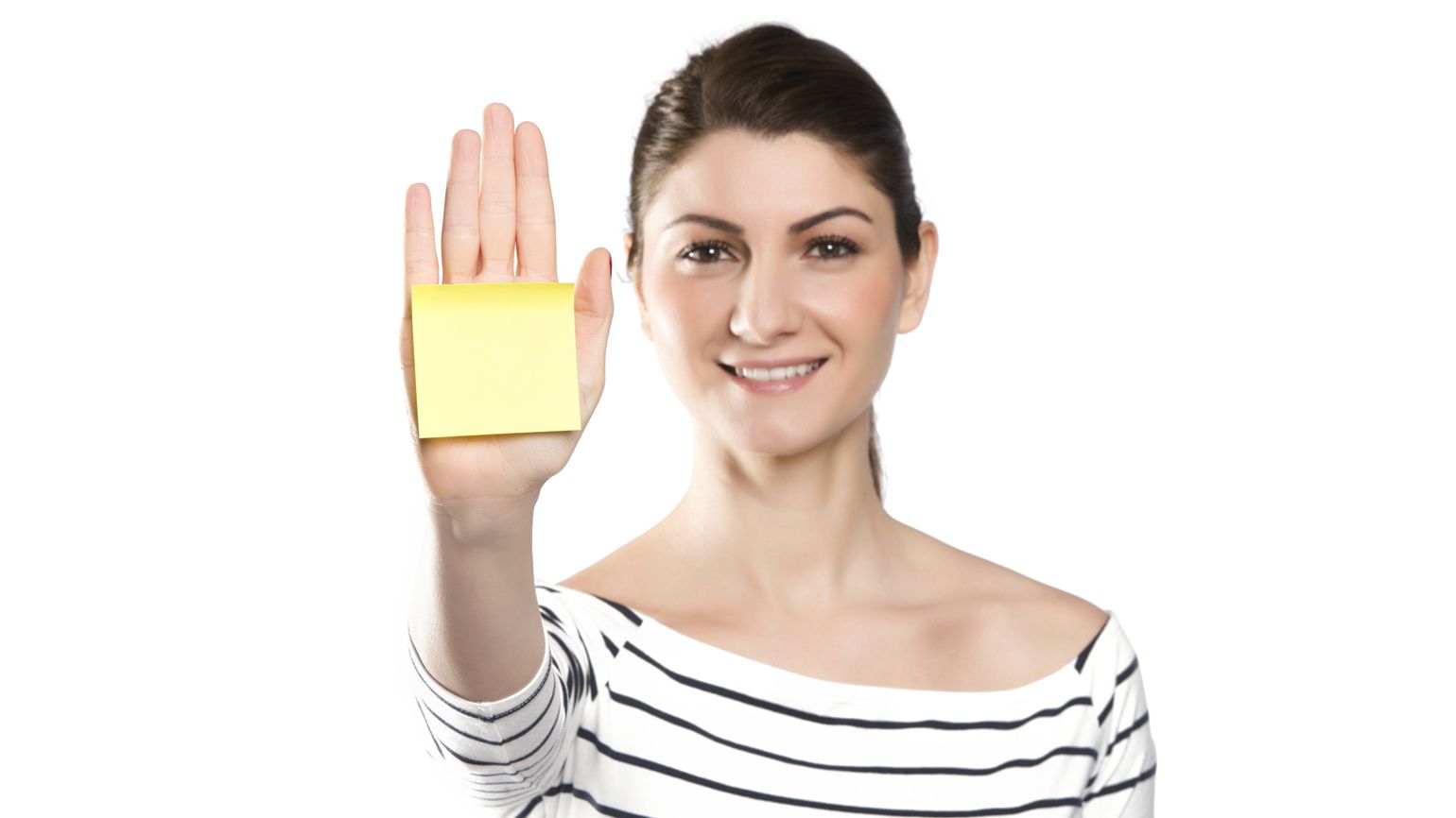 A woman with a post-it note on her hand.